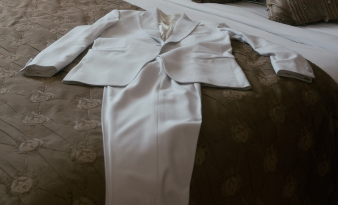 Nessa’s immaculate white trouser suit for the groundbreaking.