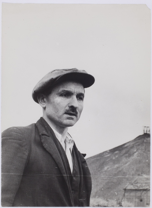 Man wearing a hat and a moustache, France. Robert Capa, 1936. © Cornell Capa