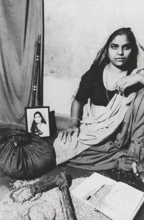 'Shanti,' Sheba Chhachhi, 1991. In her series of staged portraits, 'Seven Lives and a Dream,' Chhachhi, an activist as well as a chronicler of India's feminist movement, captured women surrounded by objects of their own choosing. Dakshinpuri, Delhi, 1991, printed 2014. Courtesy of the Tate Collection.